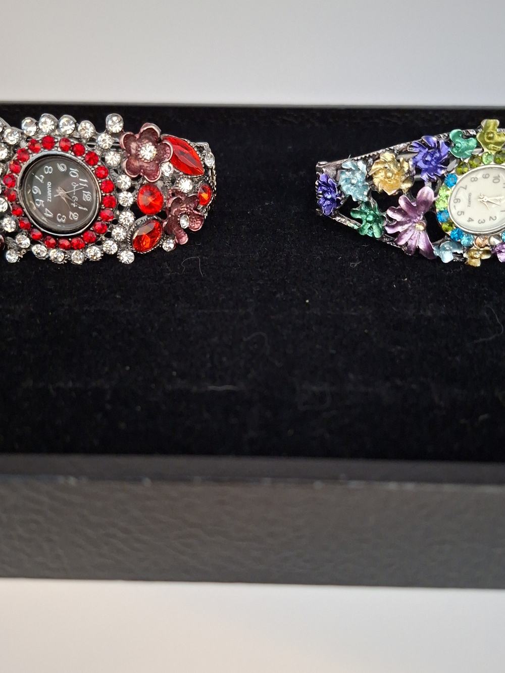 2 Rhinestone And Enamaled Cuff Watches. 1 Jessica Carlyle